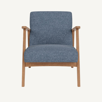 Blue upholstered armchair with wooden frame on a white background