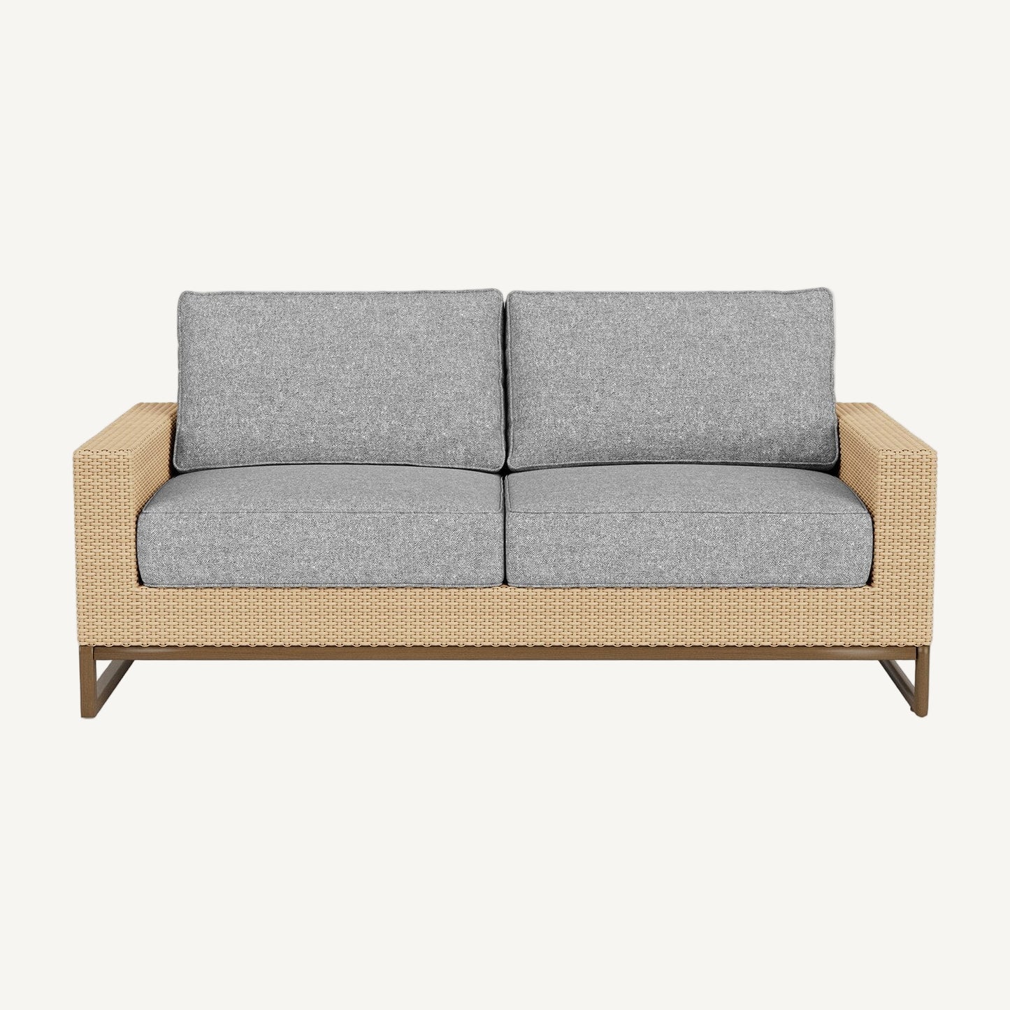 Two-seater outdoor sofa with gray cushions and a wicker frame on a white background
