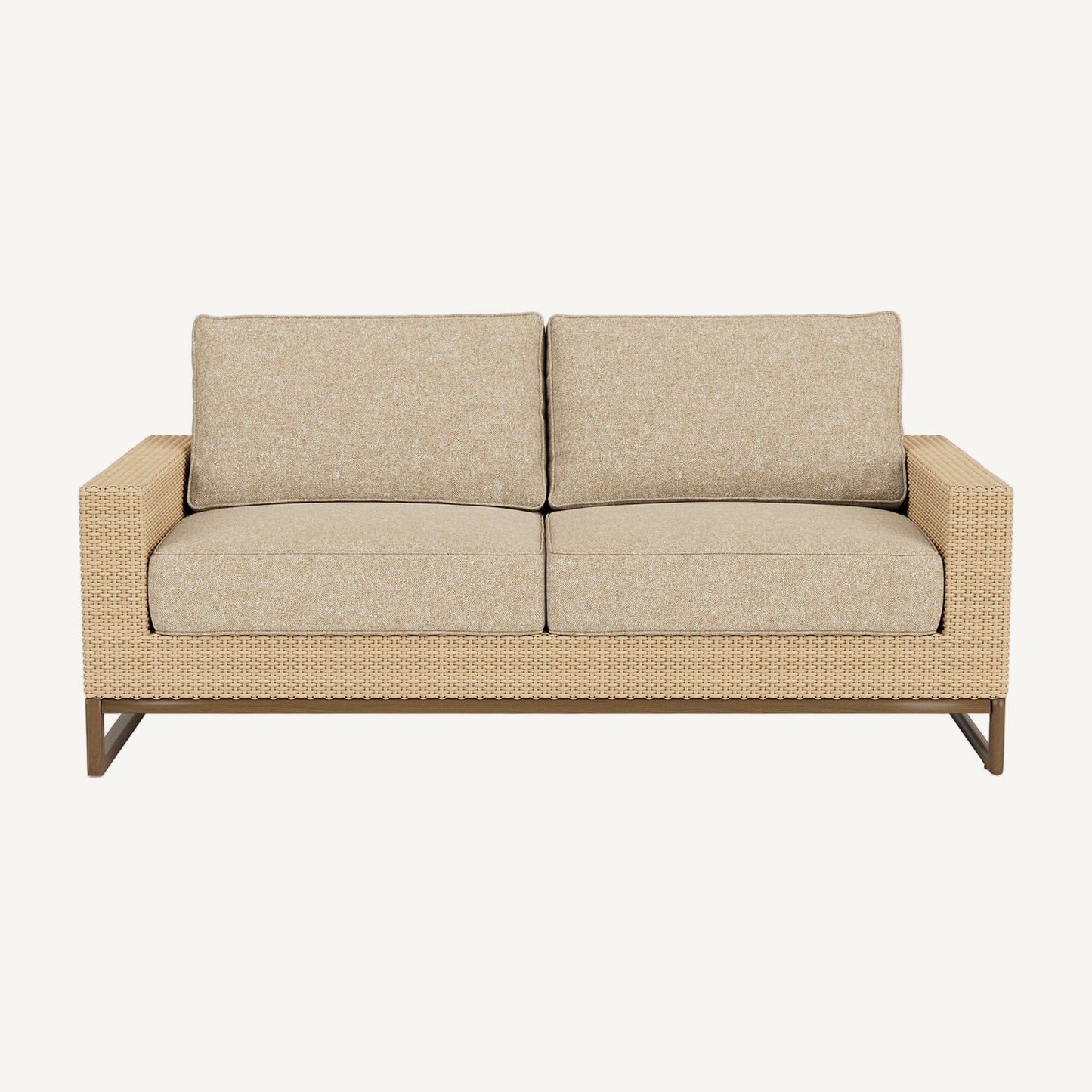 Beige outdoor sofa with wicker frame on a white background