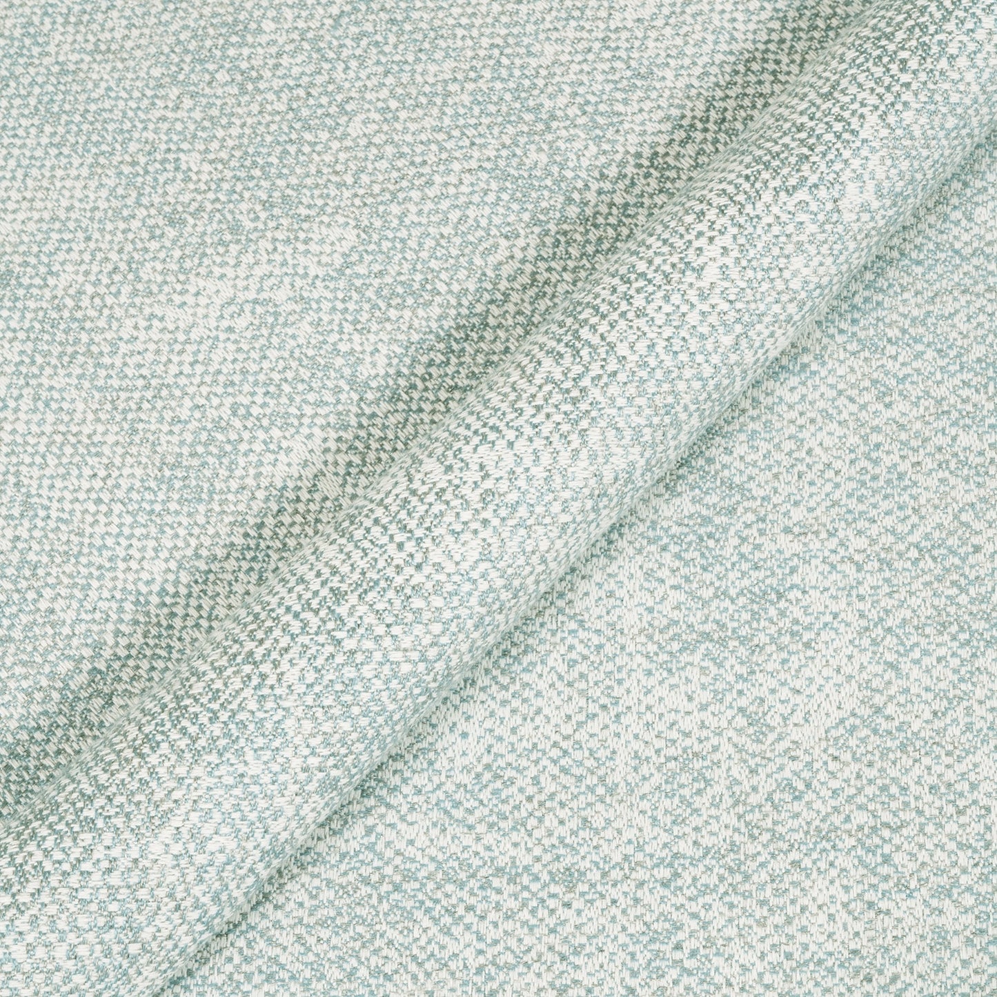 Close-up of a textured light blue fabric surface