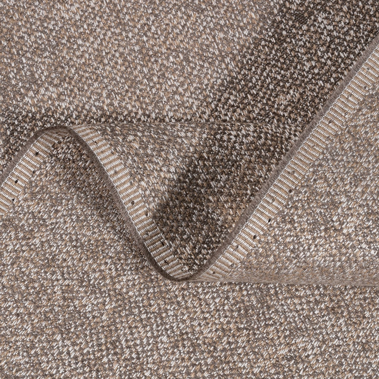 Close-up of a textured brown carpet roll