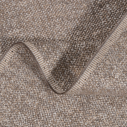 Close-up of a textured brown carpet roll