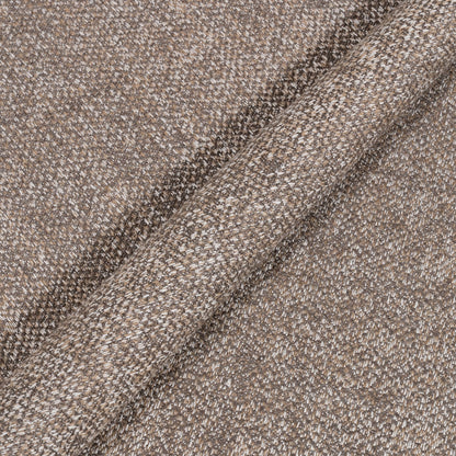 Close-up of textured brown fabric with a subtle pattern
