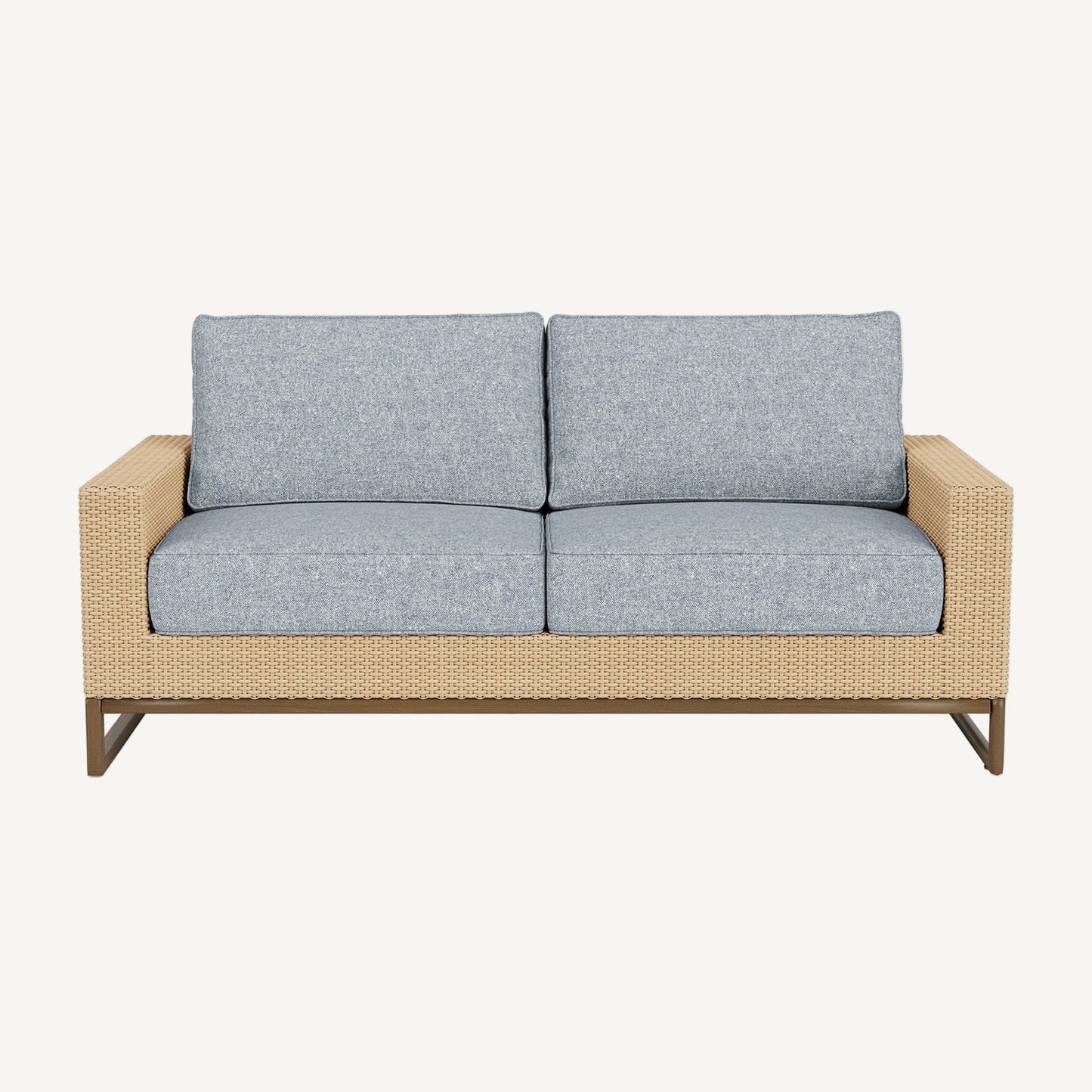 Two-seater outdoor sofa with light gray cushions and a wicker frame on a white background