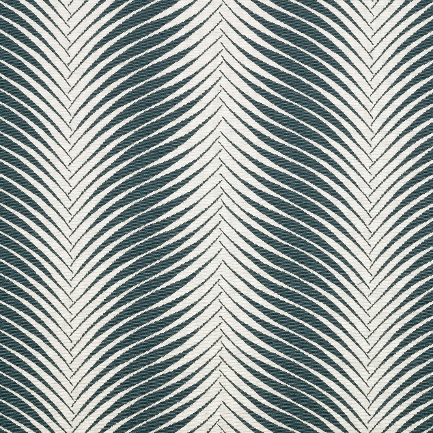 Pattern of wavy lines in teal and white on a textured fabric background