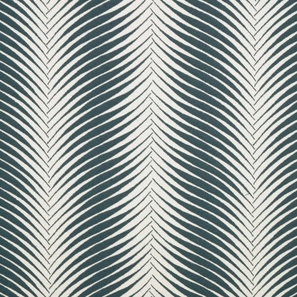 Pattern of wavy lines in teal and white on a textured fabric background