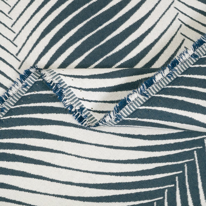 Close-up of fabric with blue and white striped pattern