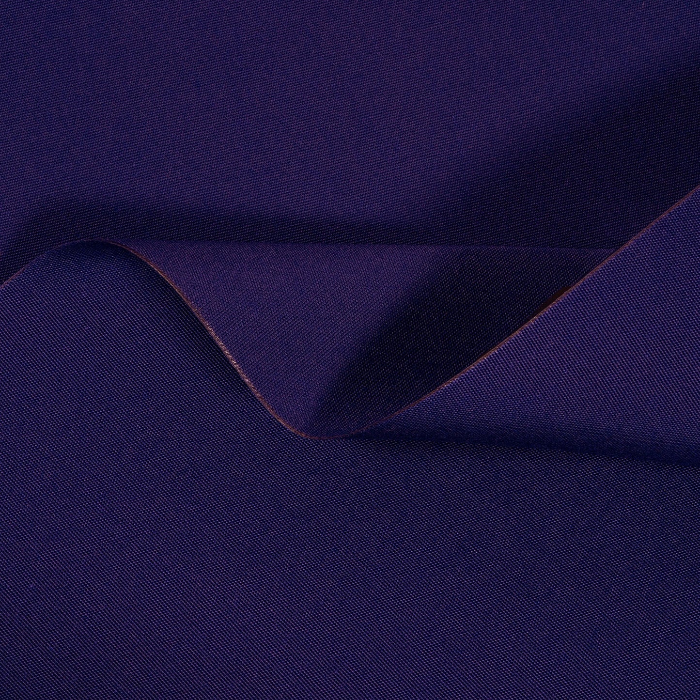 Navy blue fabric with a slight texture and fold