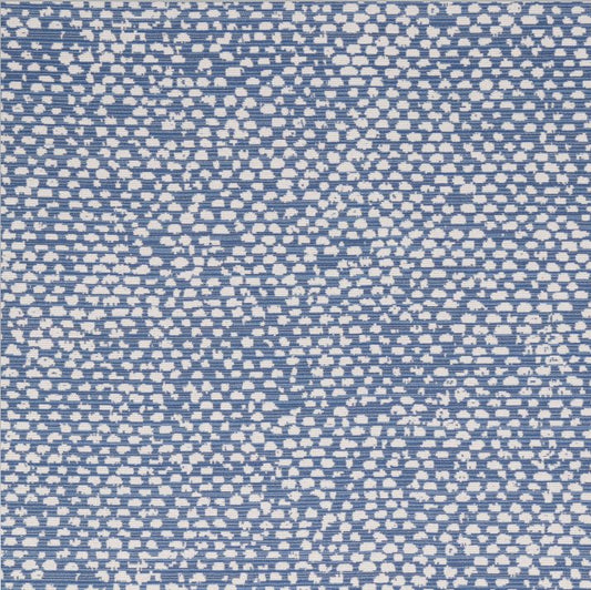 Textured blue and white patterned fabric swatch