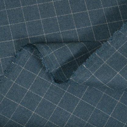 Close-up of blue checkered fabric with a grid pattern