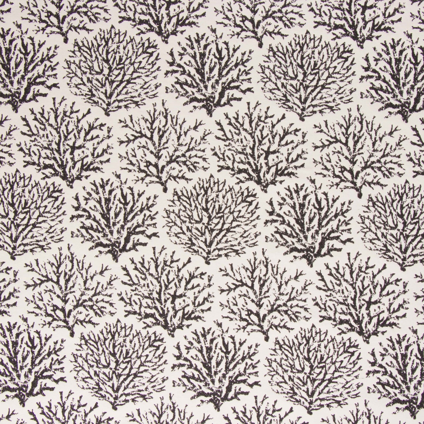 Pattern of black coral branches on a beige background