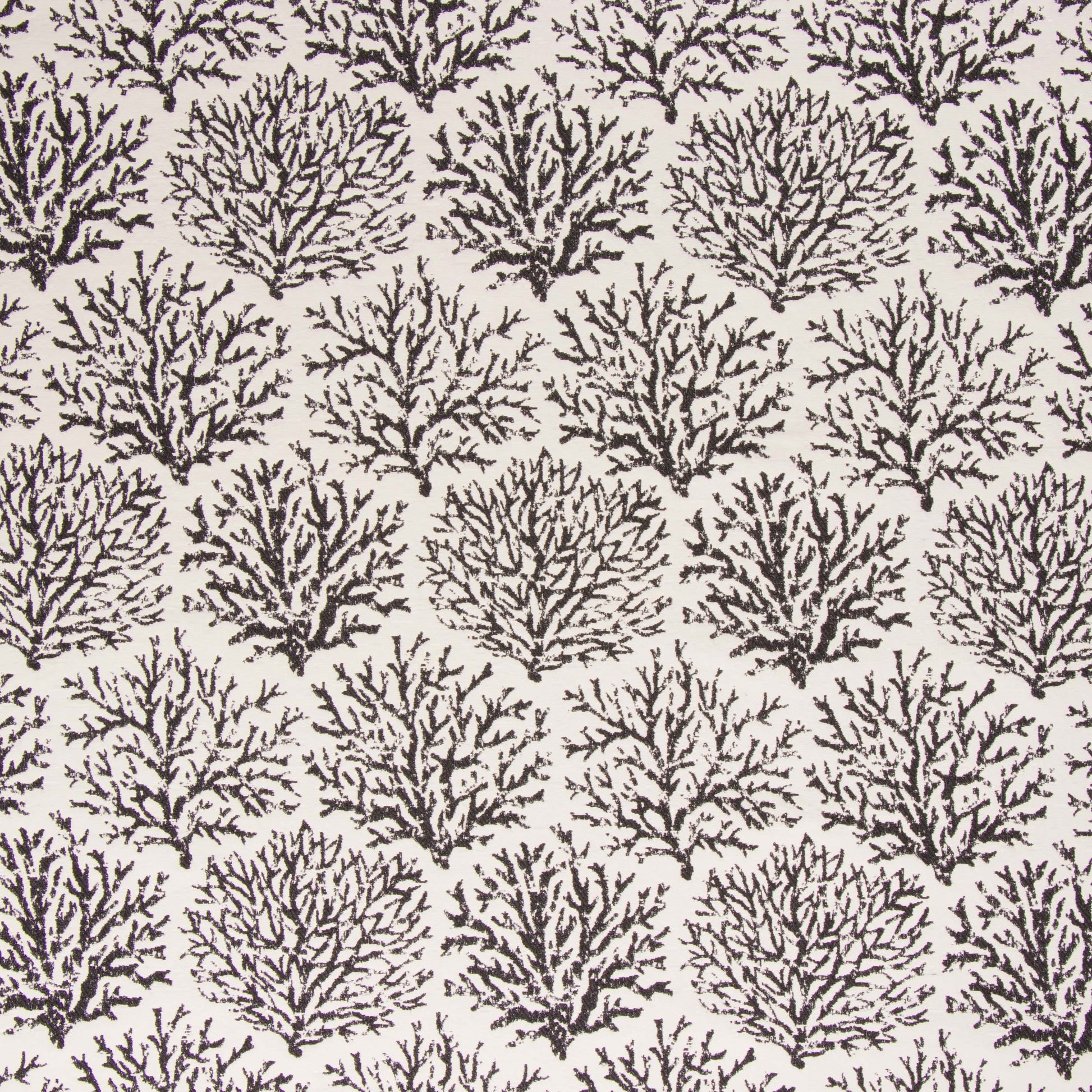 Pattern of black coral branches on a beige background