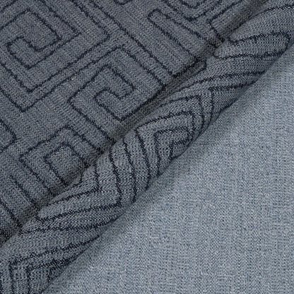 Close-up of textured gray fabric with geometric pattern