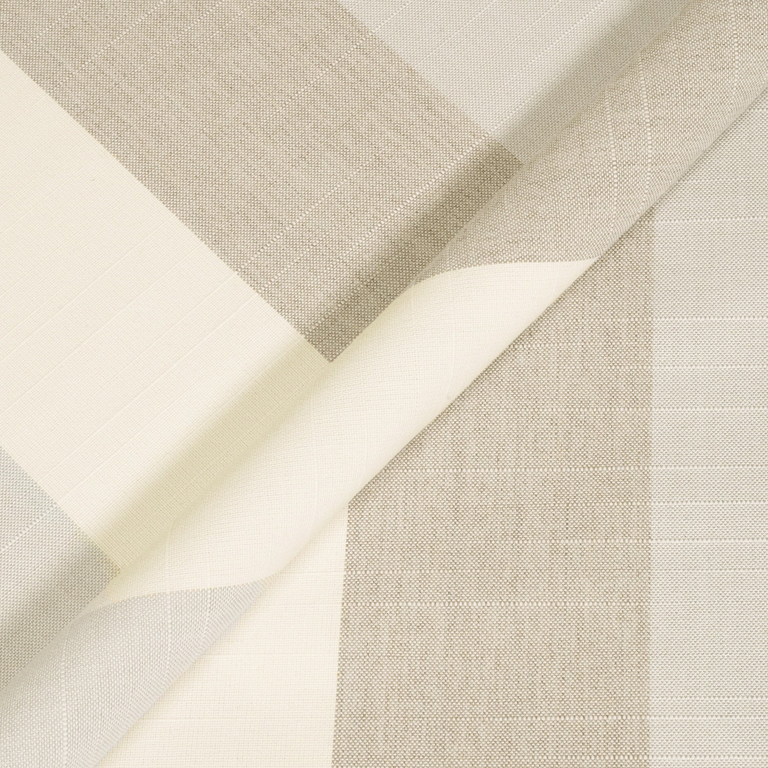 Close-up of beige and white fabric with a subtle pattern