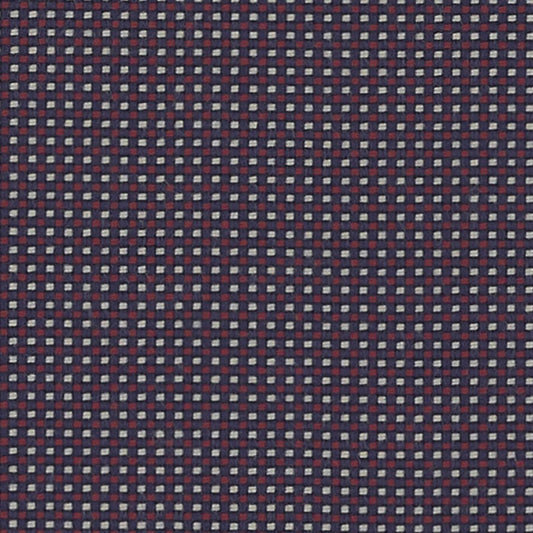 Close-up view of a multicolored fabric with a geometric grid pattern.