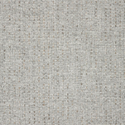 A close-up image of a textured beige fabric.