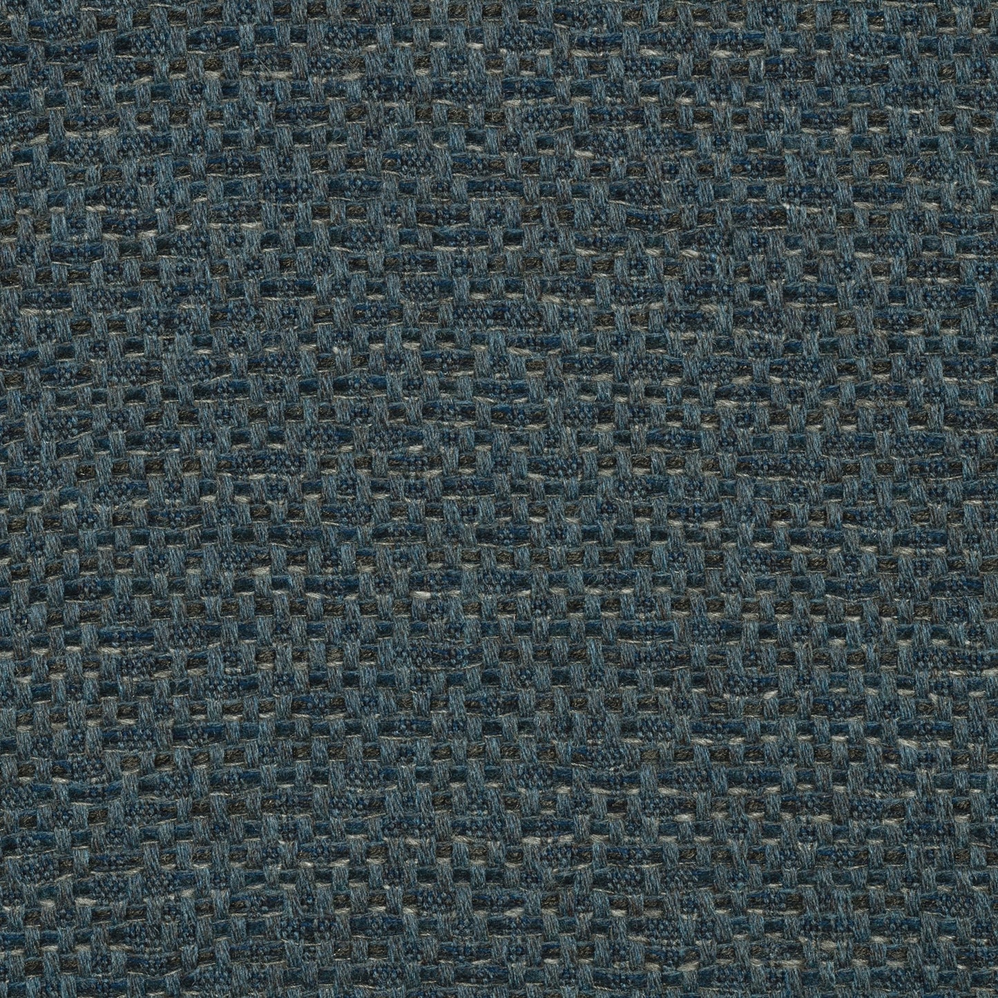 A close-up view of a textured blue fabric with a shibori pattern.