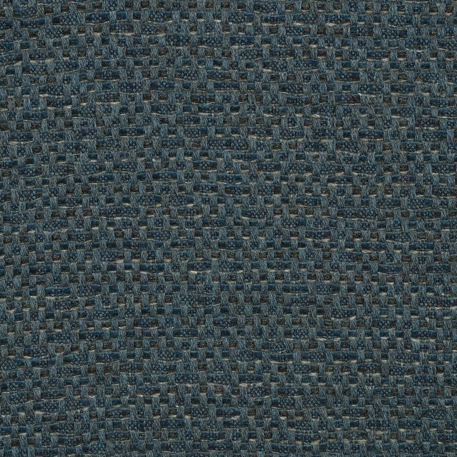 A close-up view of a textured blue fabric with a shibori pattern.