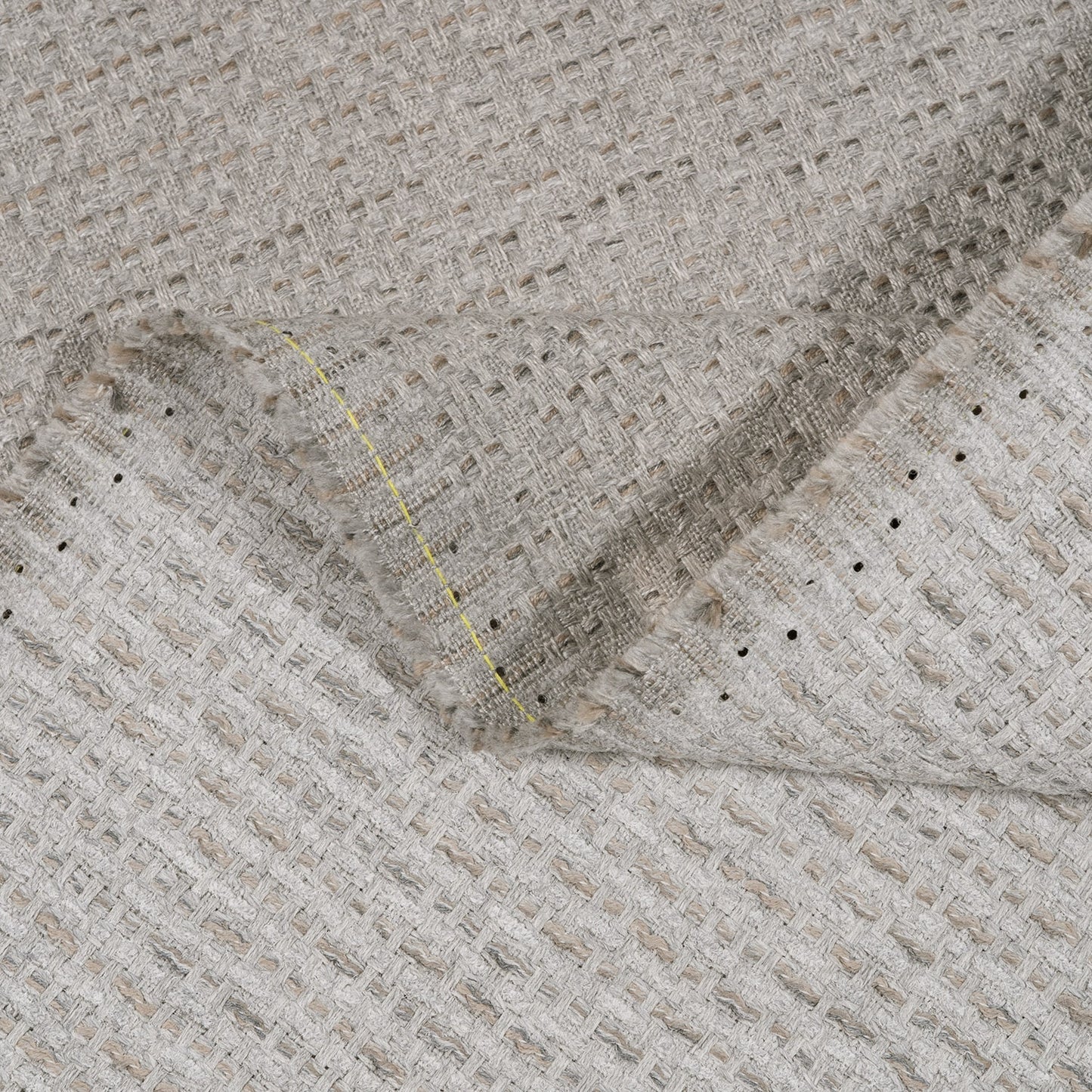 Close-up of textured fabric with a diagonal fold