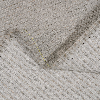 Close-up of textured fabric with a diagonal fold