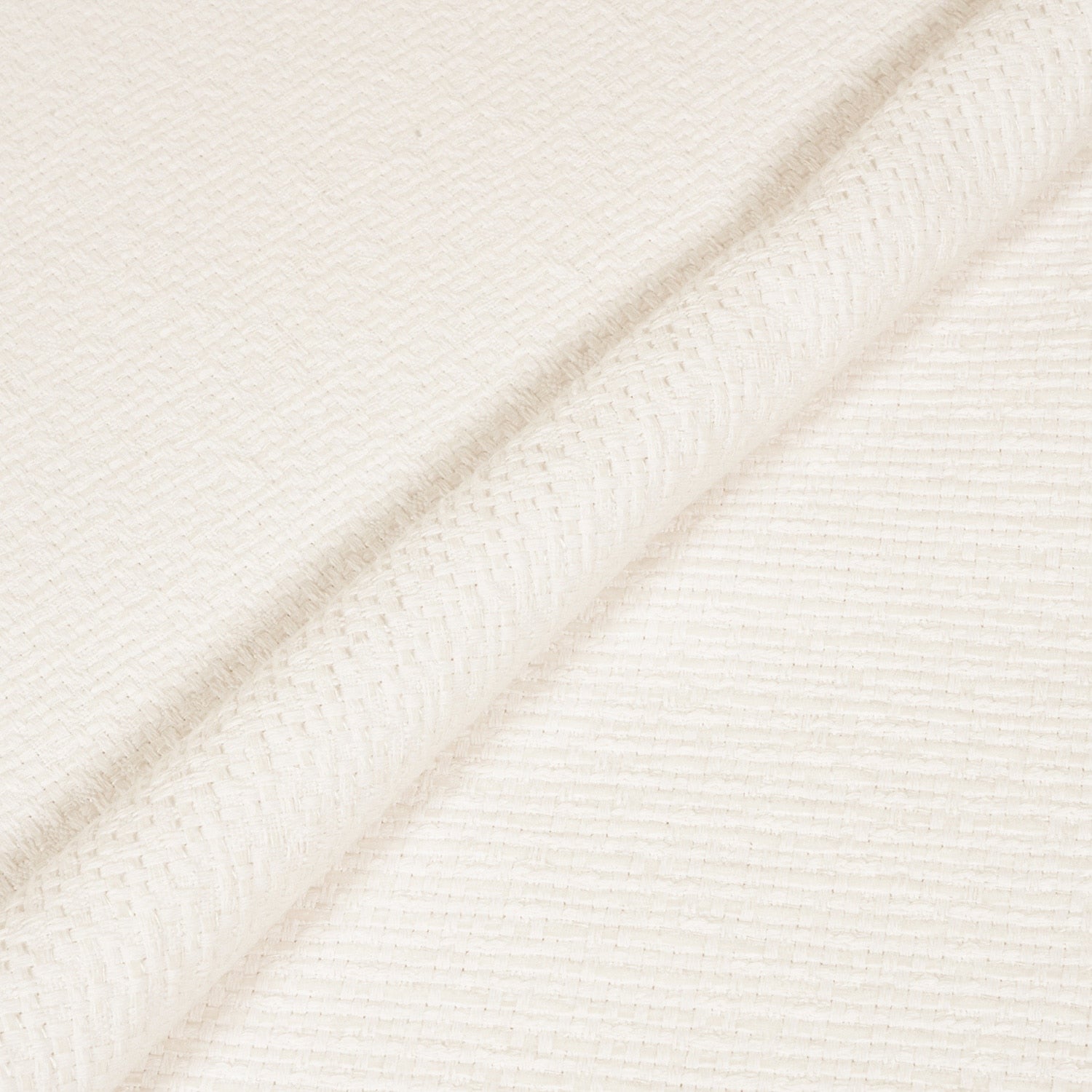 Close-up of a textured white fabric with diagonal lines