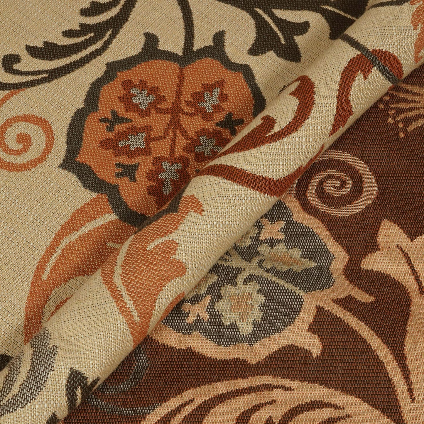 Close-up of patterned fabric with brown, beige, and blue design