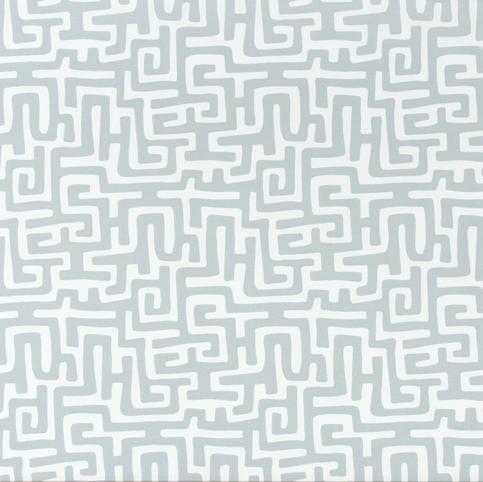 Patterned fabric with maze-like design on a white background