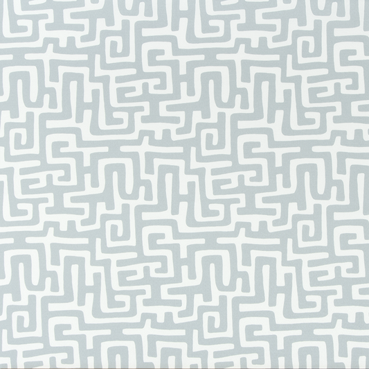 Patterned fabric with maze-like design on a white background