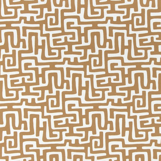 Patterned fabric with white maze-like design on a beige background