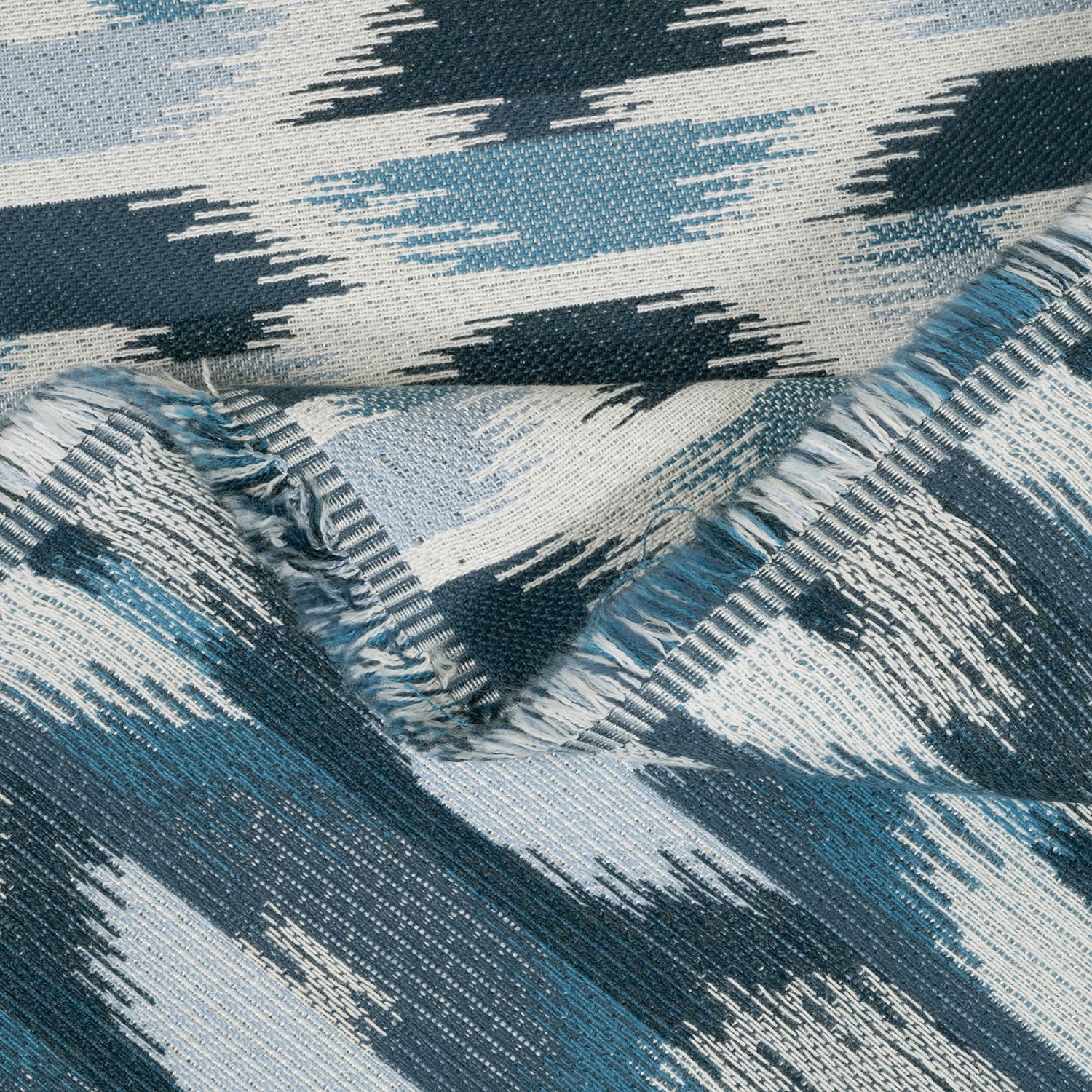 Close-up of textured fabric with blue and gray pattern