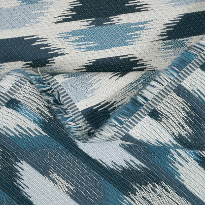 Close-up of textured fabric with blue and gray pattern