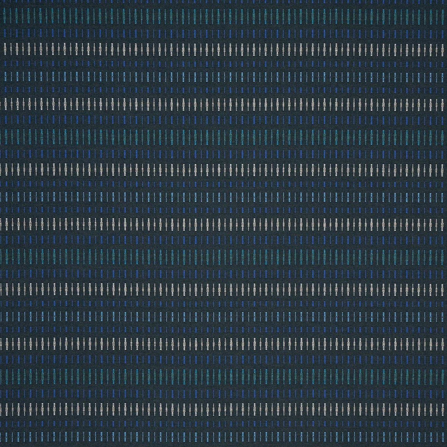 Patterned fabric with blue and gray stripes on a dark blue background