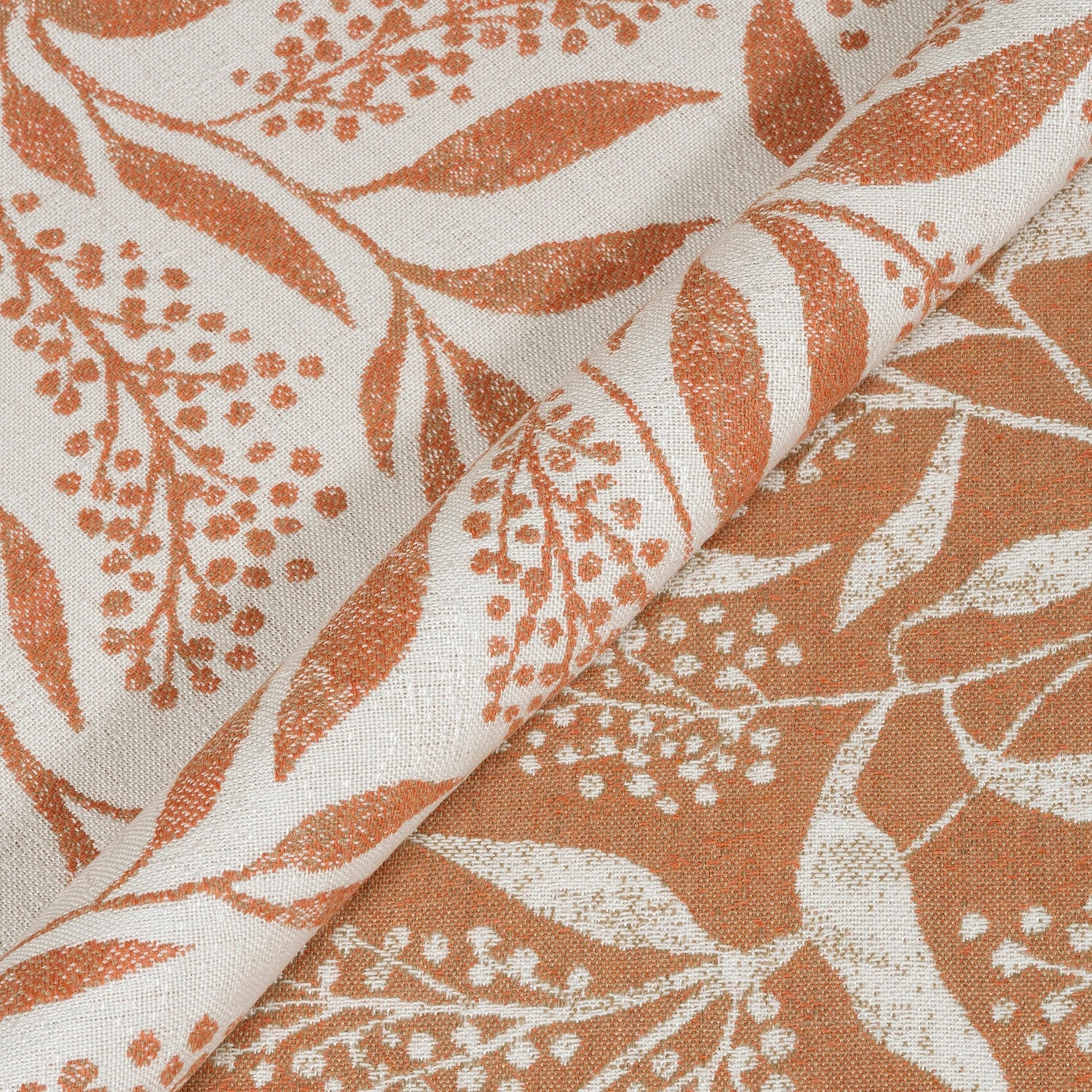 Fabric with orange and white floral pattern