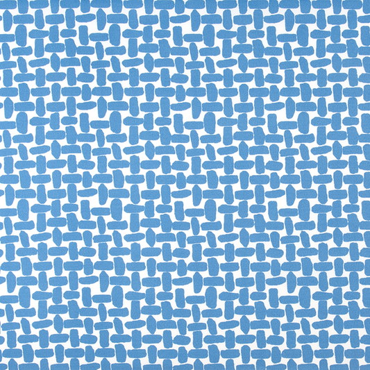 Patterned fabric with blue shapes on a blue background