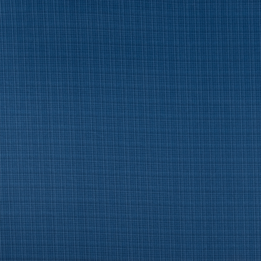 Blue fabric texture with a grid pattern on a wooden surface