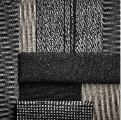 Close-up of textured black and gray fabric swatches