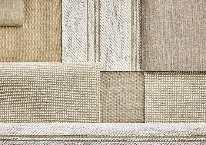 Collection of beige and brown textured fabric swatches arranged in a grid pattern.