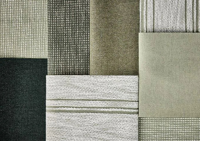 Patterned fabric swatches in various shades of green and gray.