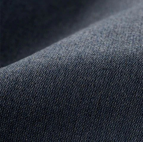 Close-up of dark denim fabric texture