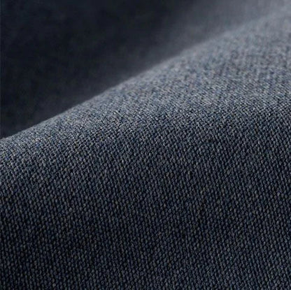 Close-up of dark denim fabric texture