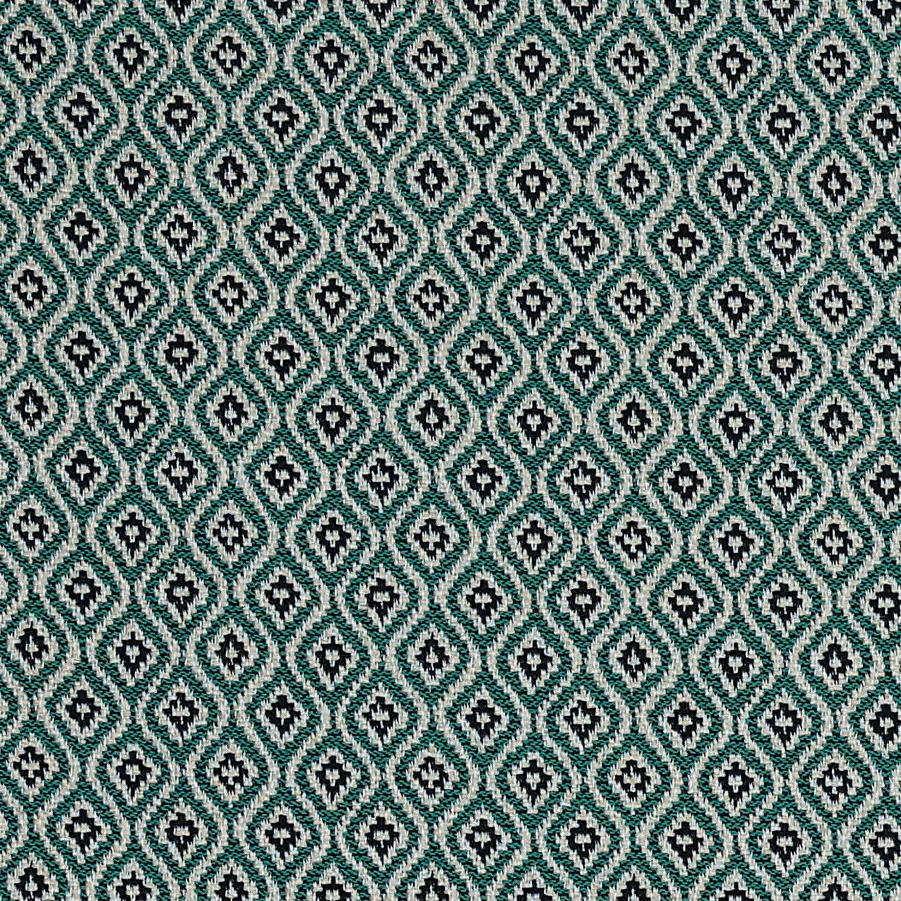 Patterned fabric with a geometric design in teal, black, and white.
