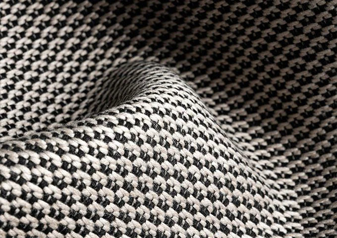 Close-up of black and white checkered fabric texture