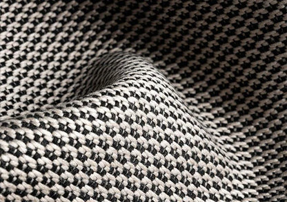 Close-up of black and white checkered fabric texture