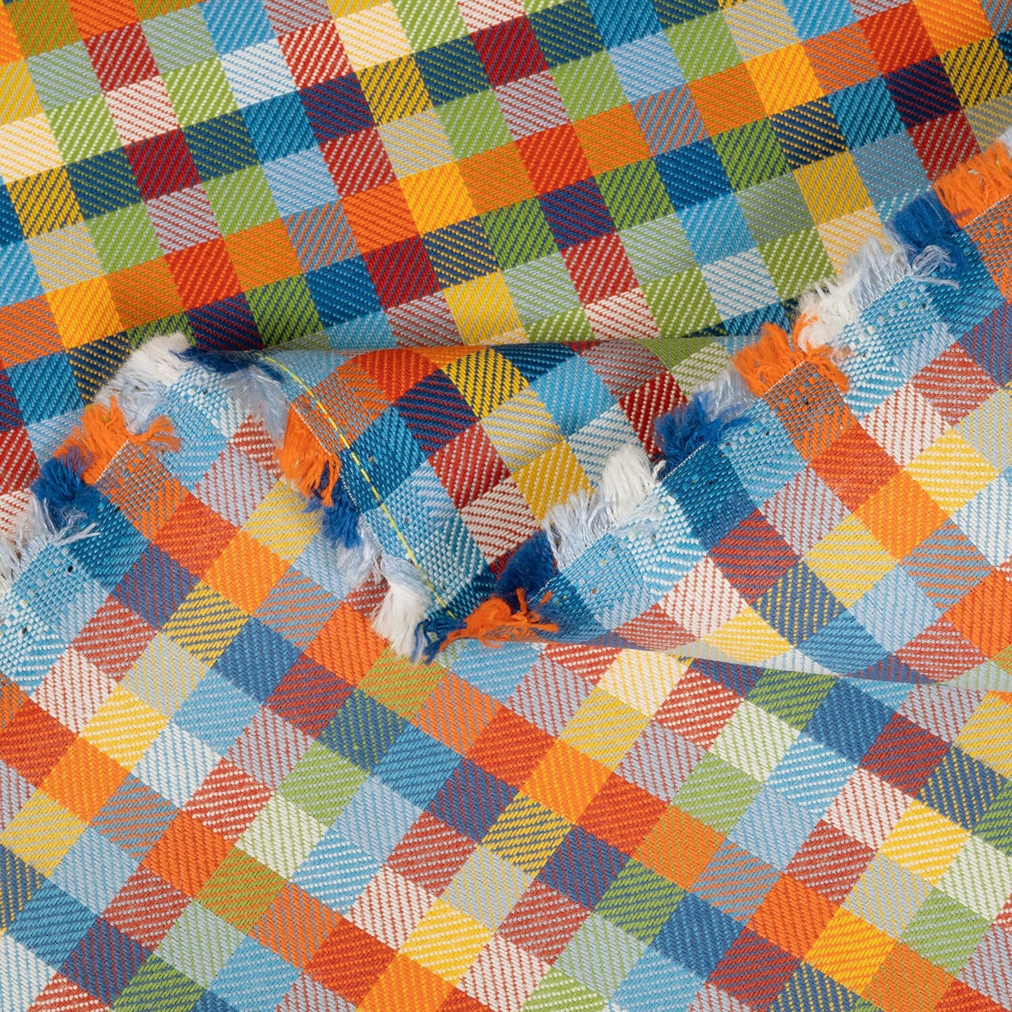 Colorful checkered fabric with a pattern of squares in various colors.