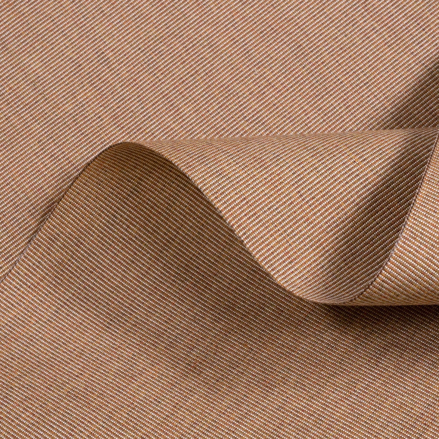 Close-up of brown fabric with a subtle pattern