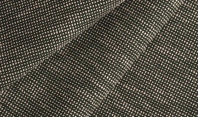 Close-up of black textured fabric with a subtle pattern