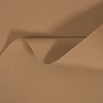 Close-up of beige fabric with a slight texture