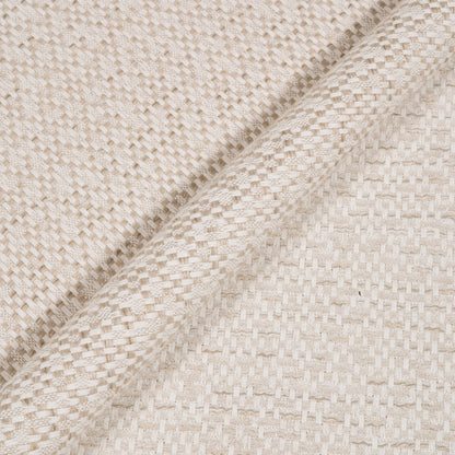 Close-up of beige woven fabric texture