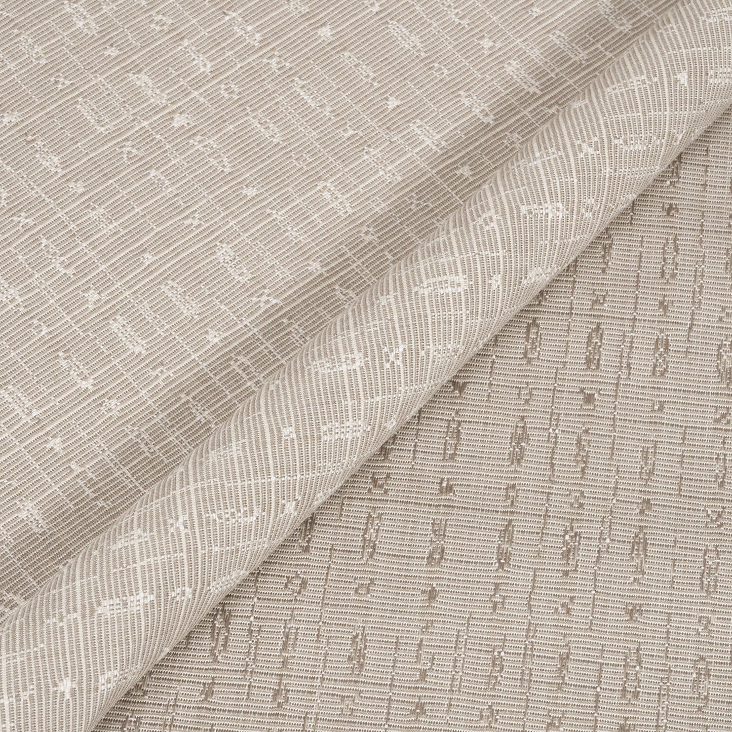 Textured fabric with a subtle pattern, shown in close-up.