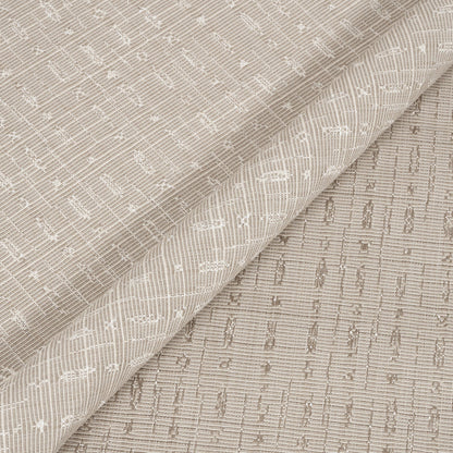 Textured fabric with a subtle pattern, shown in close-up.